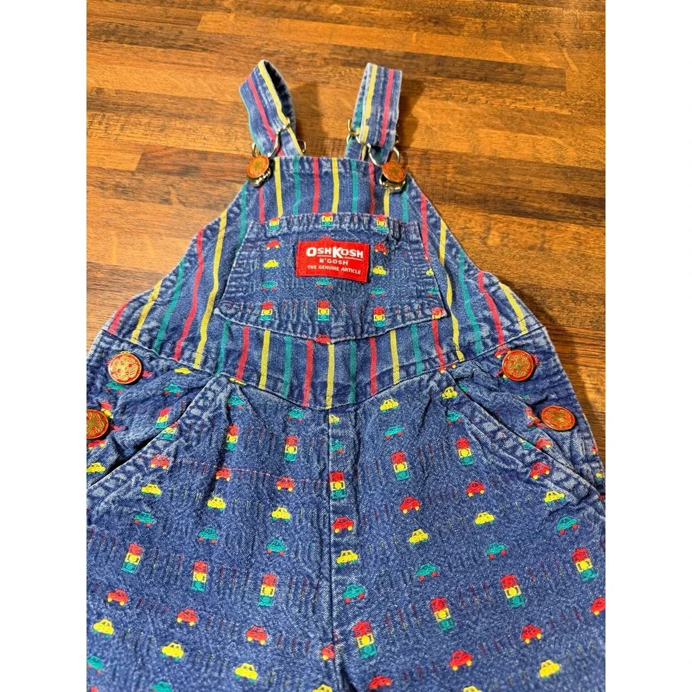 Vintage OshKosh B'gosh overalls. Sz 6/9 months. Cars, trucks and traffic lights